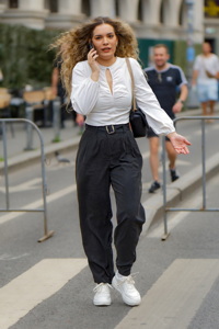 Woman talking phone on the street